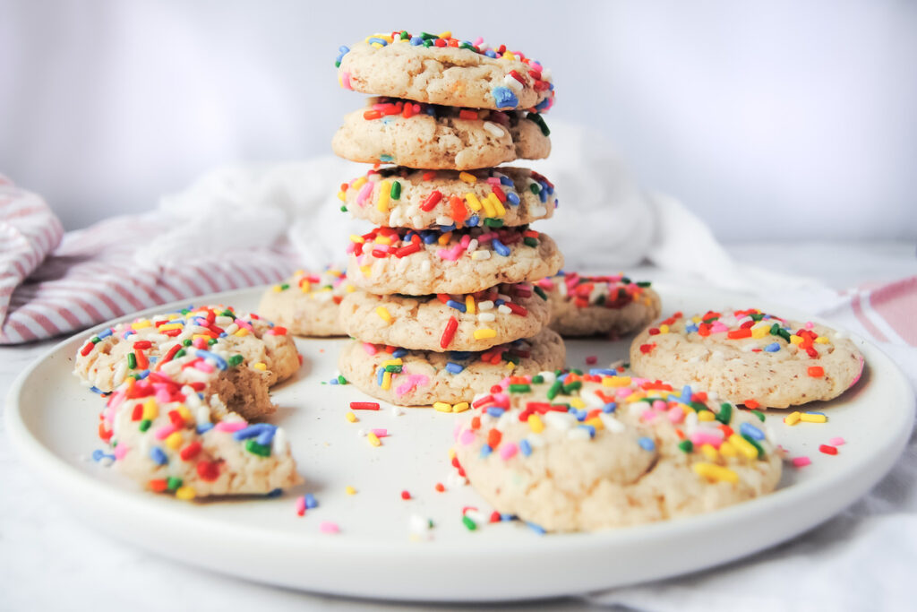 Vegan Rainbow Sprinkle Cookies on a white plate